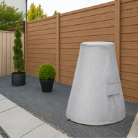 Custom Tapered Modern Chiminea Cover in light gray, shown outdoors in a contemporary backyard setting
