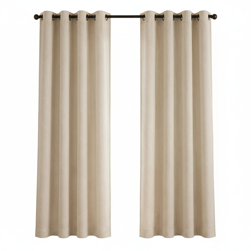 A pair of beige grommet-top window curtains hanging on a black rod in a bright room with a window, potted plant, and small side table.